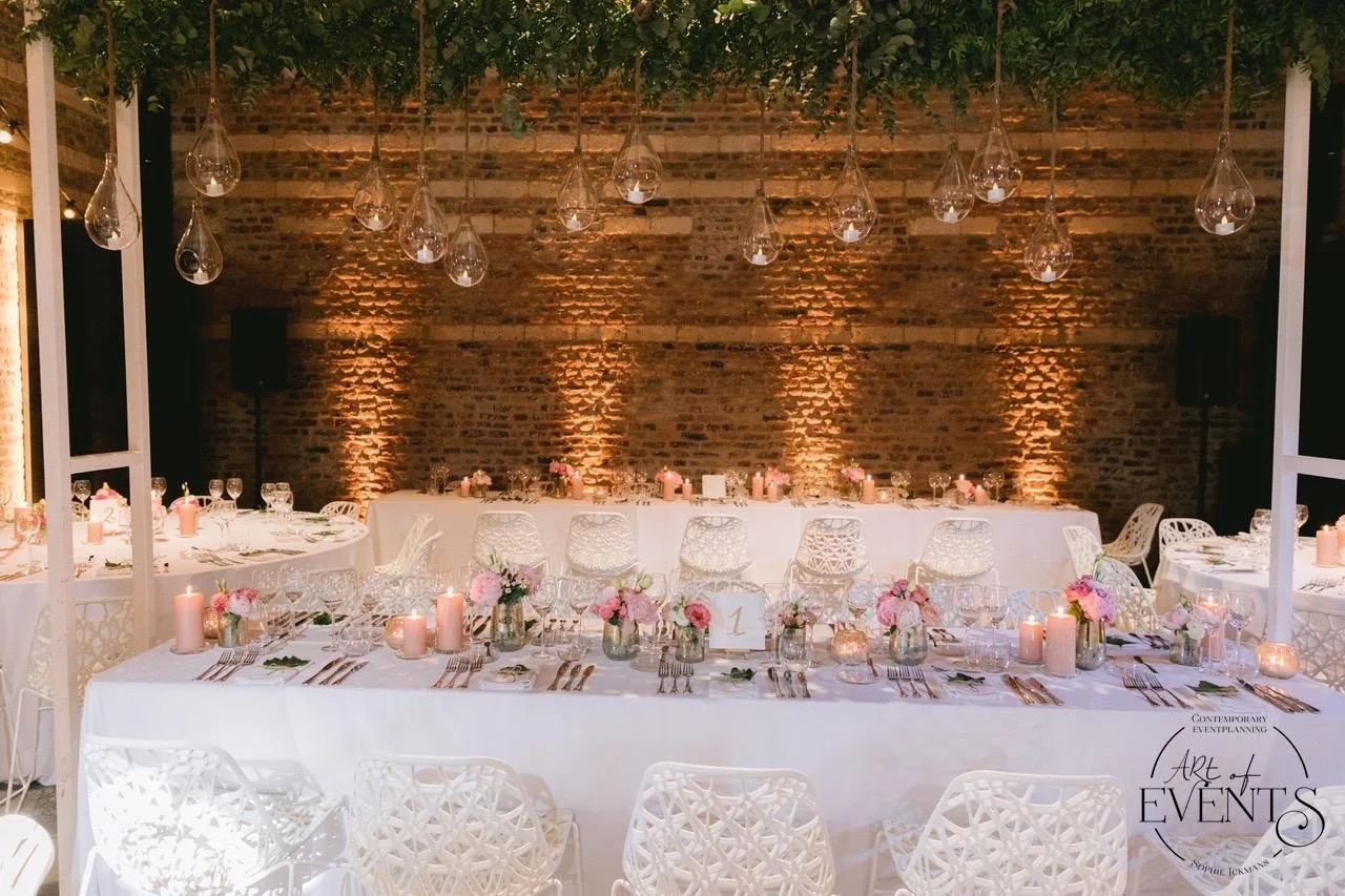 Romantic lighting decoration for a wedding at Martin's Rentmeesterij in Bilzen.