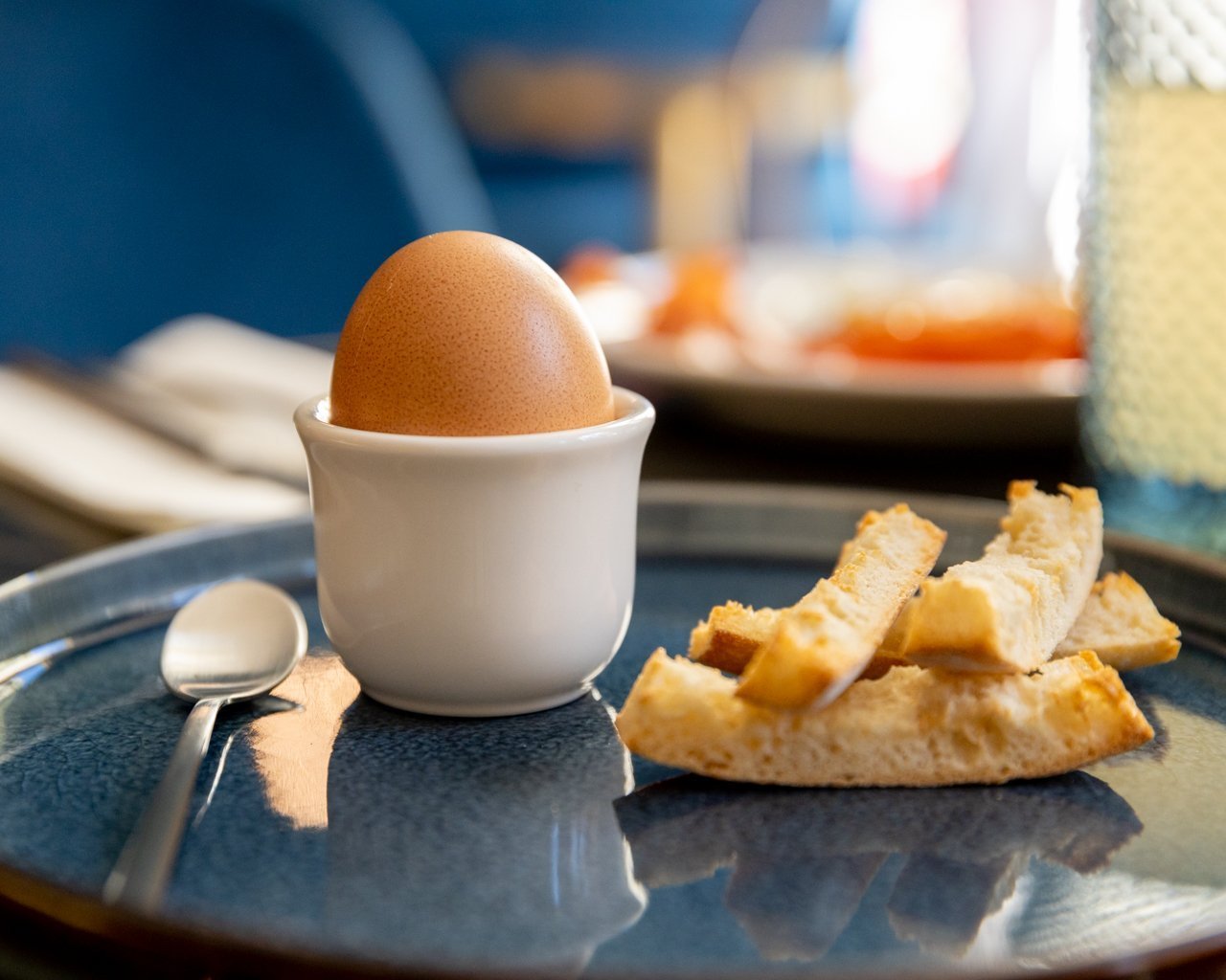 Boiled egg served with toast soldiers at the restaurant of VOCO Paris Montparnasse.