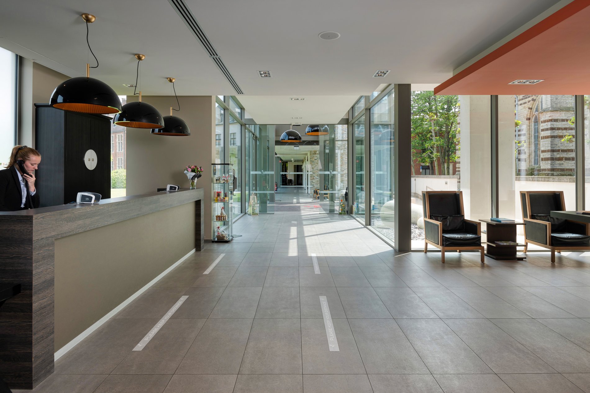 Bright and modern lobby at Martin's Klooster in Leuven.