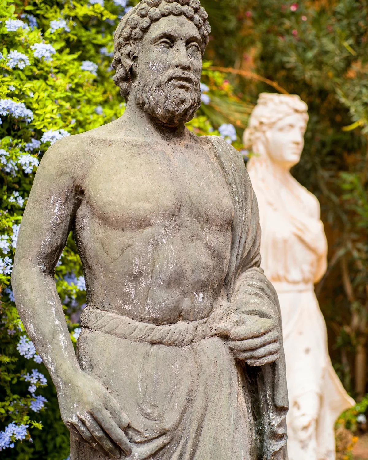 Le Berbère Palace, Bearded stone antique statue in the gardens of Berbère Palace