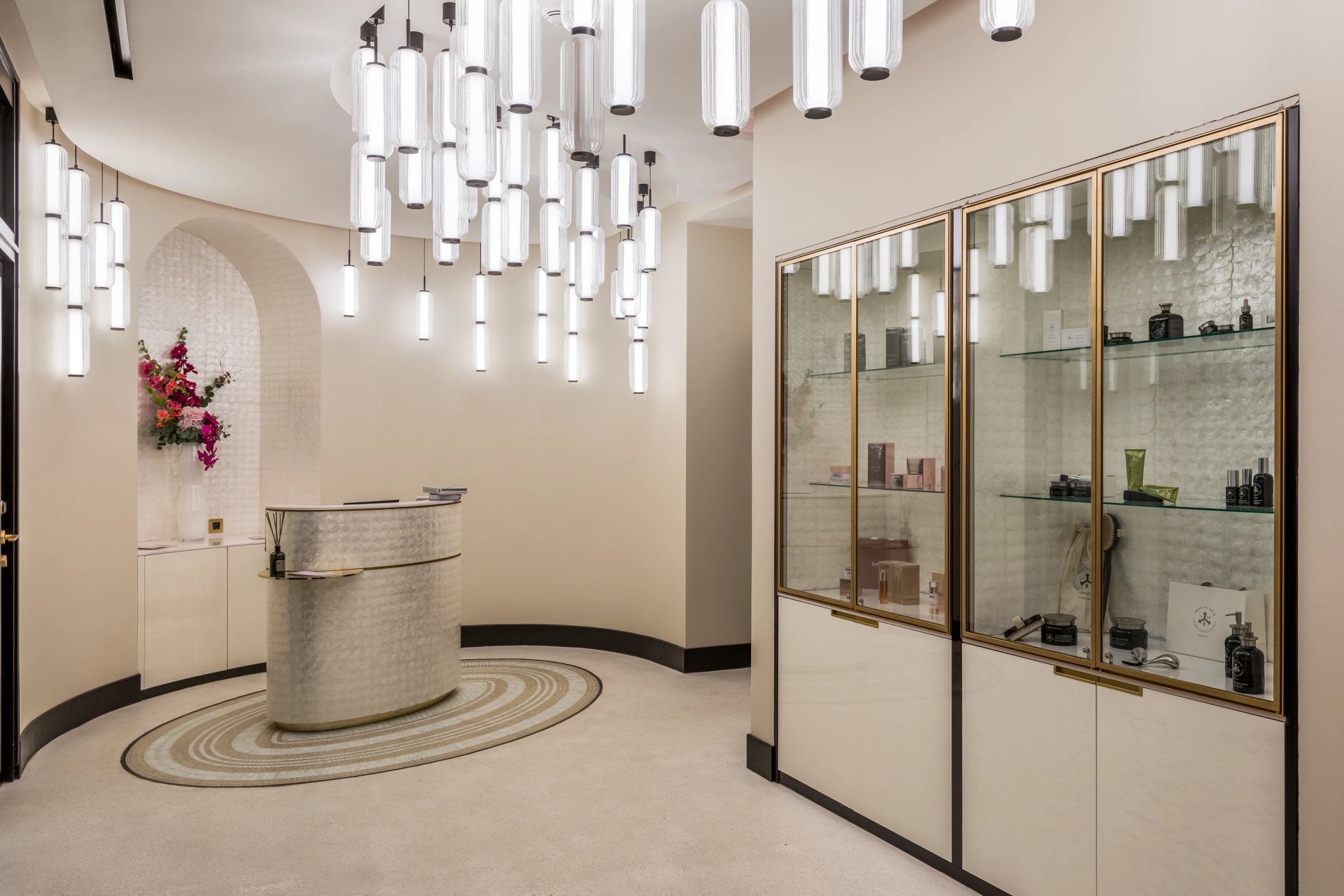 Maison Albar - Le Victoria | SPA home with silver countertop, desiign ceiling light, and flowers