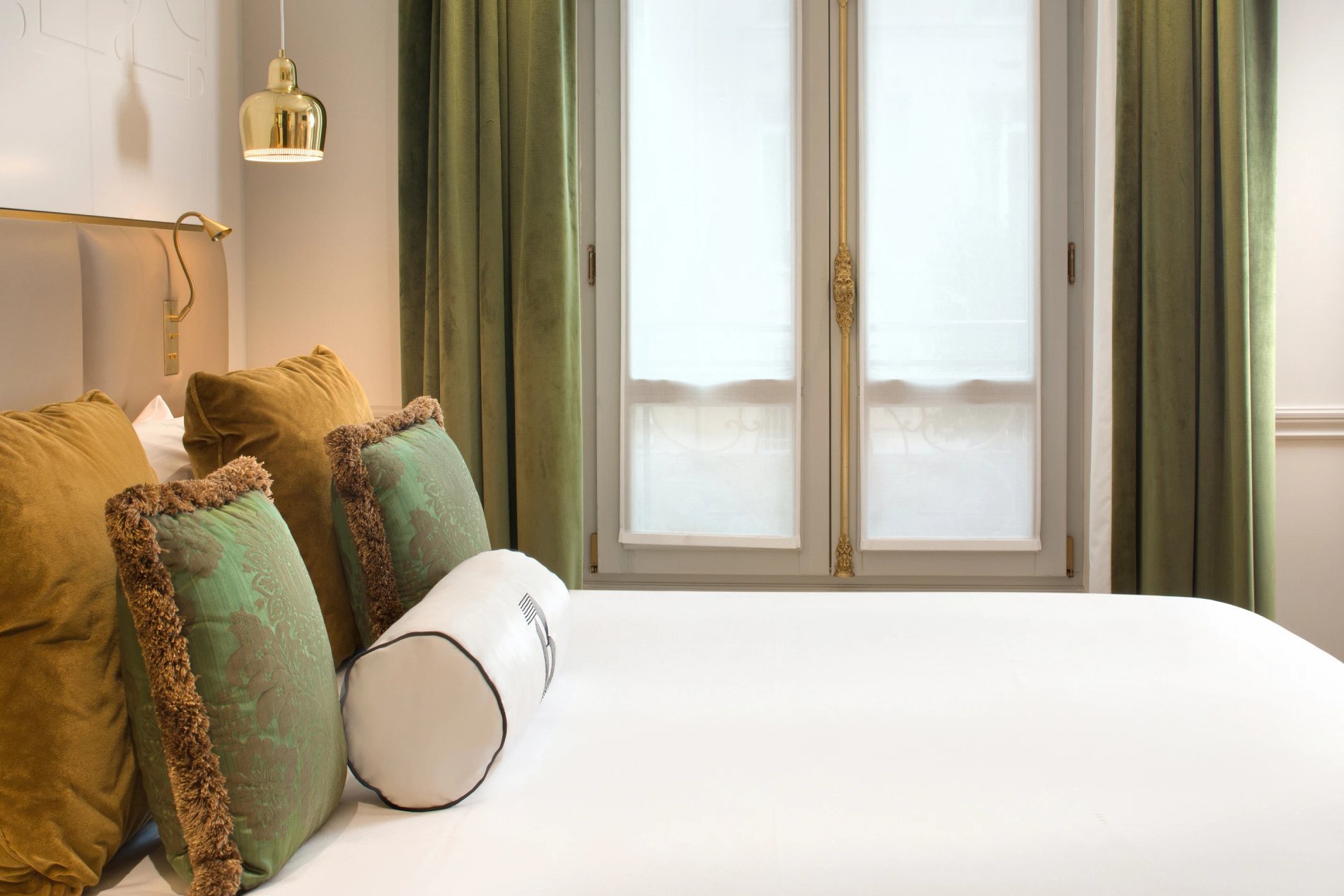 Hôtel Bowmann | Lit de la chambre Deluxe
