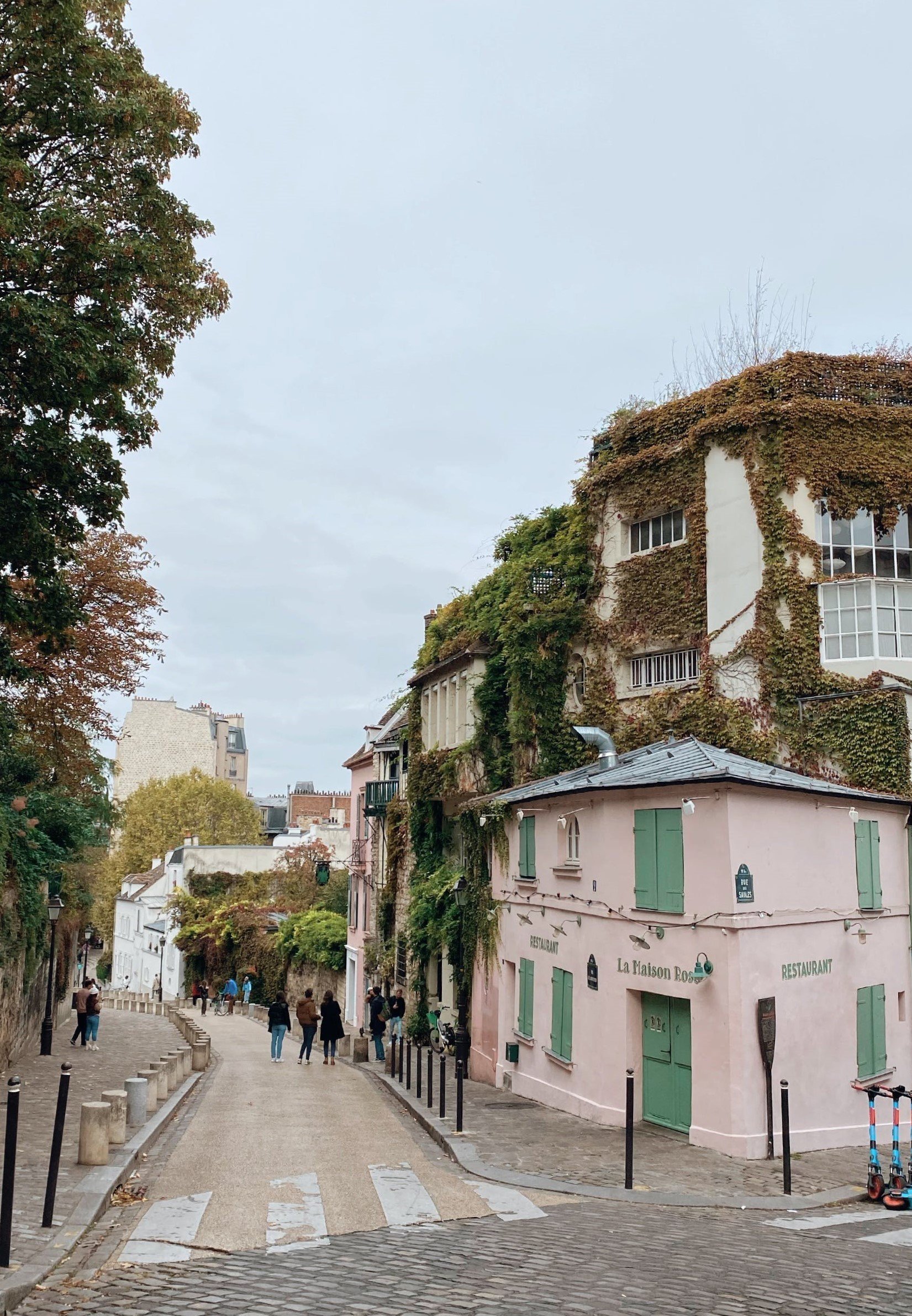 Picturesque street in Montmartre Paris with colorful houses and authentic charm