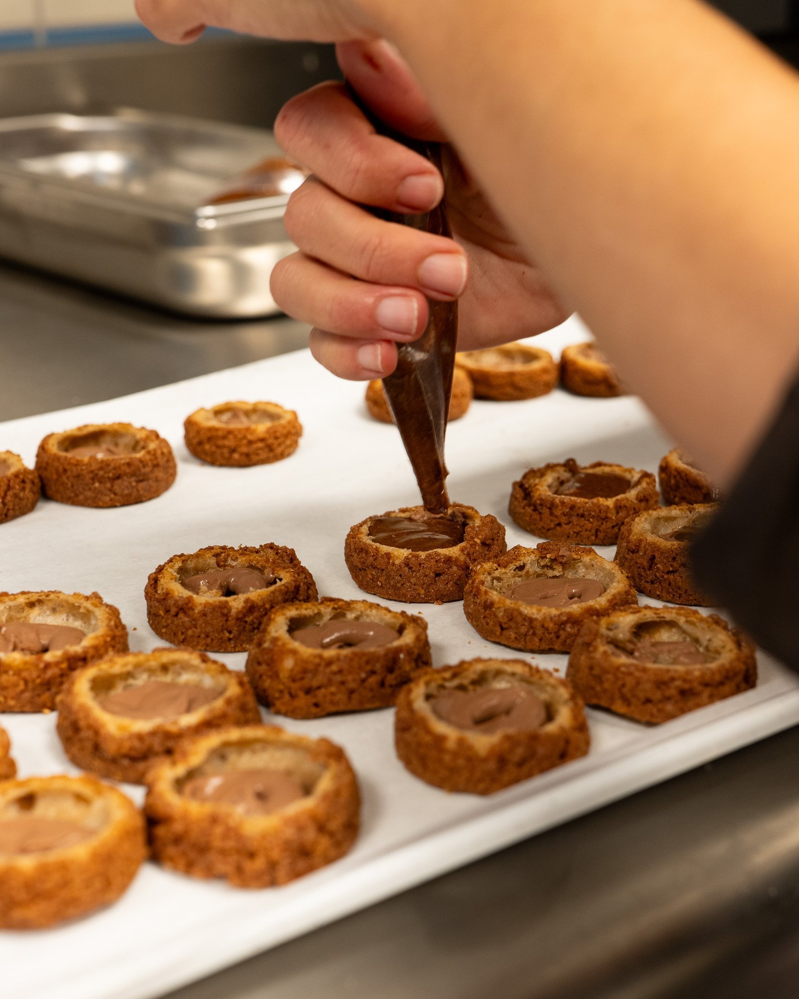 Preparing small sweets in the kitchen of Maison Albar - Le Victoria.