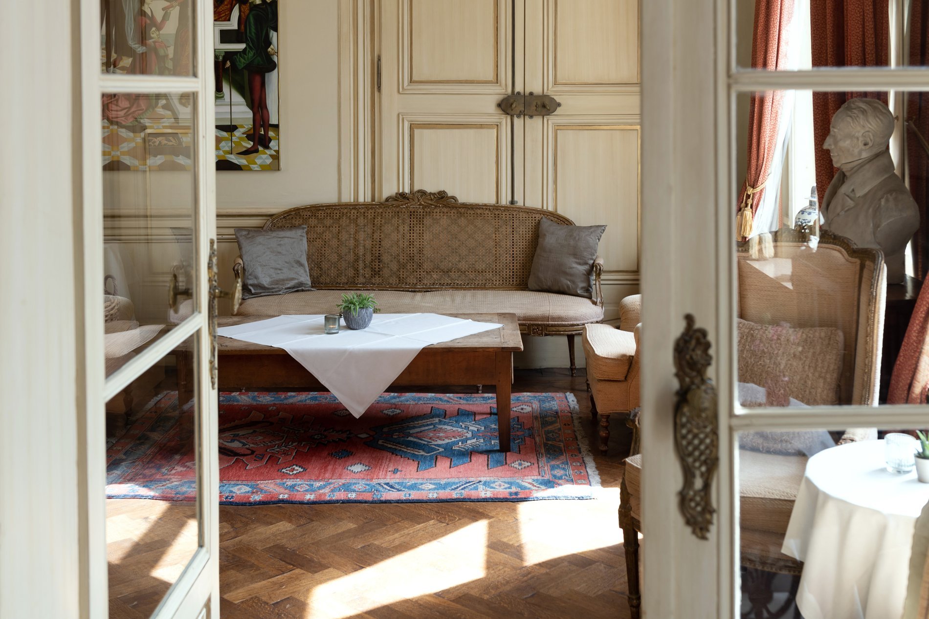 Elegantly decorated table in a refined room at Martin’s Relais Hotel.