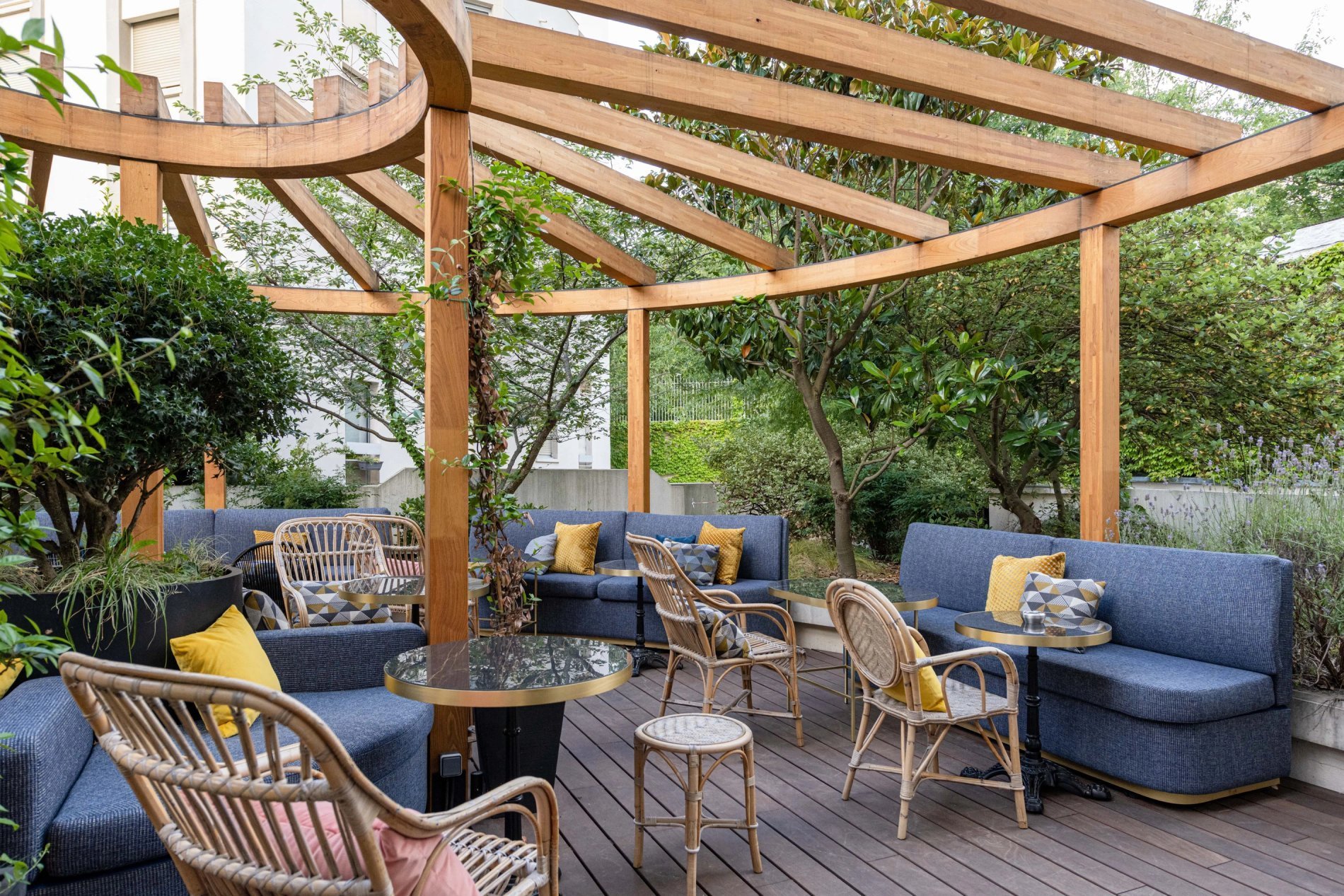 Green and welcoming terrace of the restaurant at VOCO Paris Montparnasse.