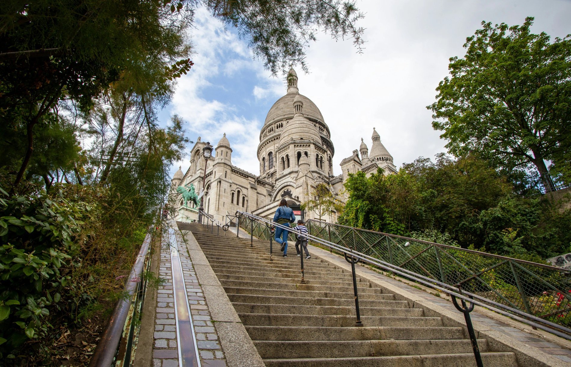 Steps leading to Sacré-Cœur in Montmartre, must-see site near Hotel Chamar.