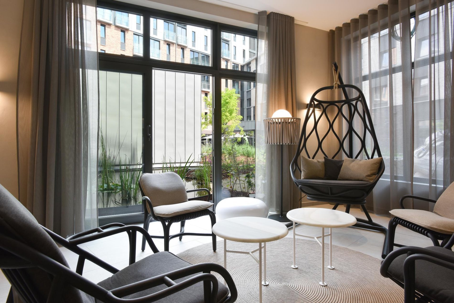Bright and elegant relaxation area at Martin's Hotels spa.