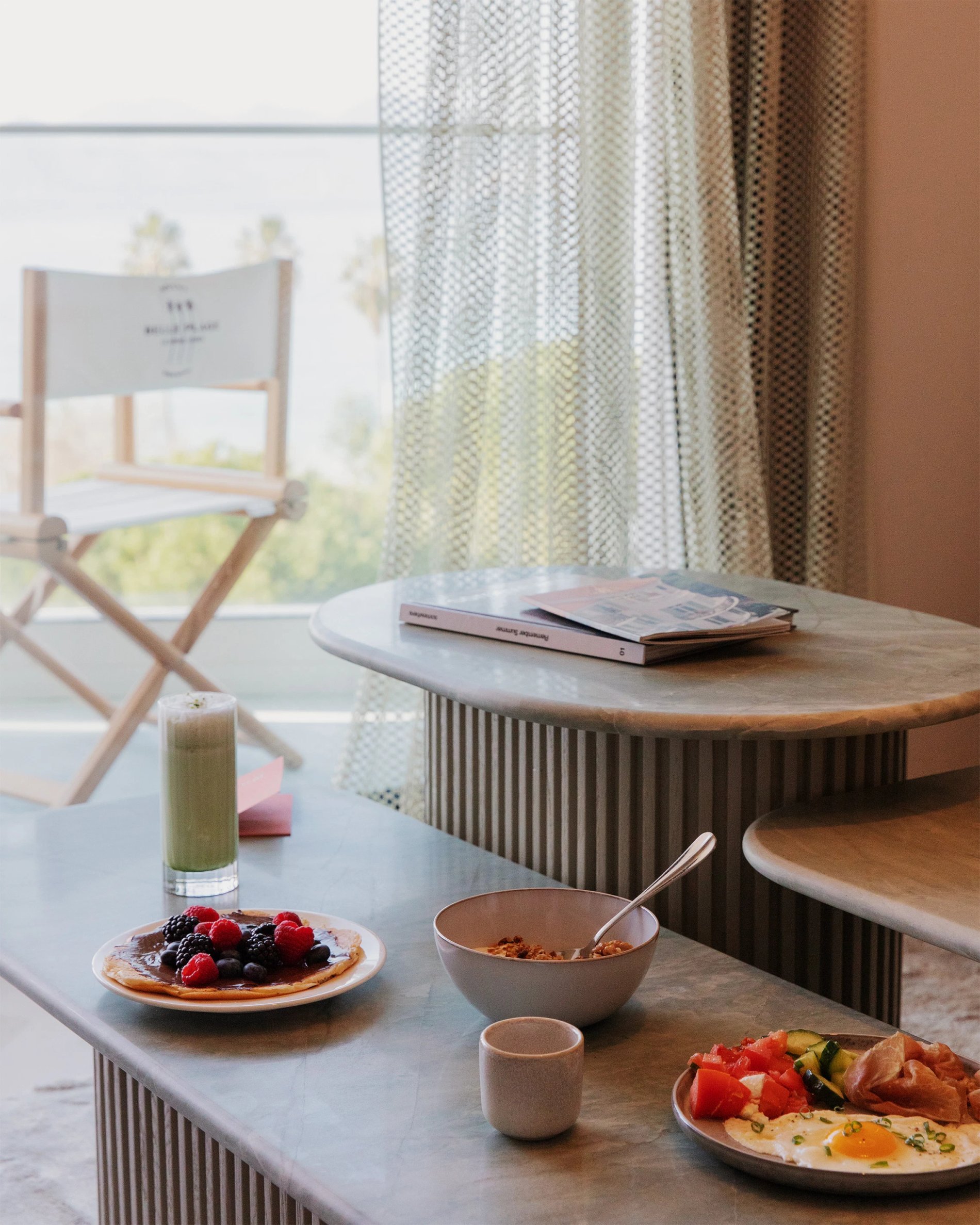Healthy and colorful breakfast indoors with sea view at Hôtel Belle Plage