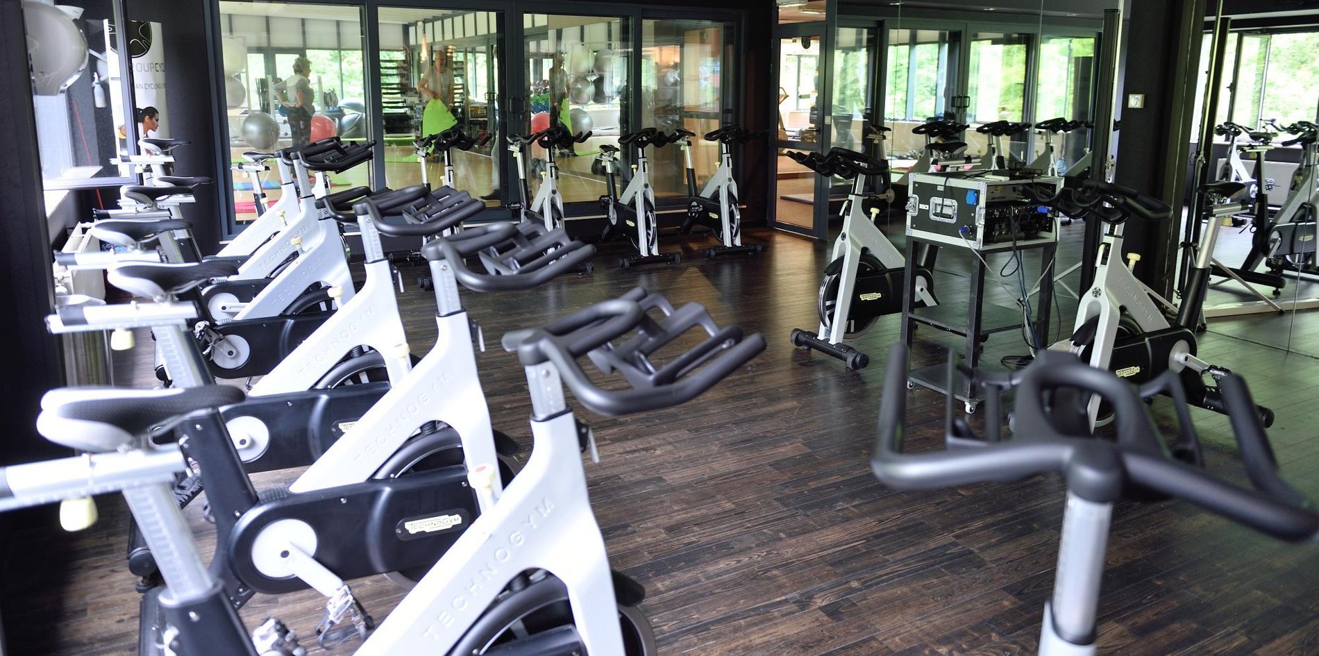 Fully equipped gym with panoramic view at Martin's Château du Lac.