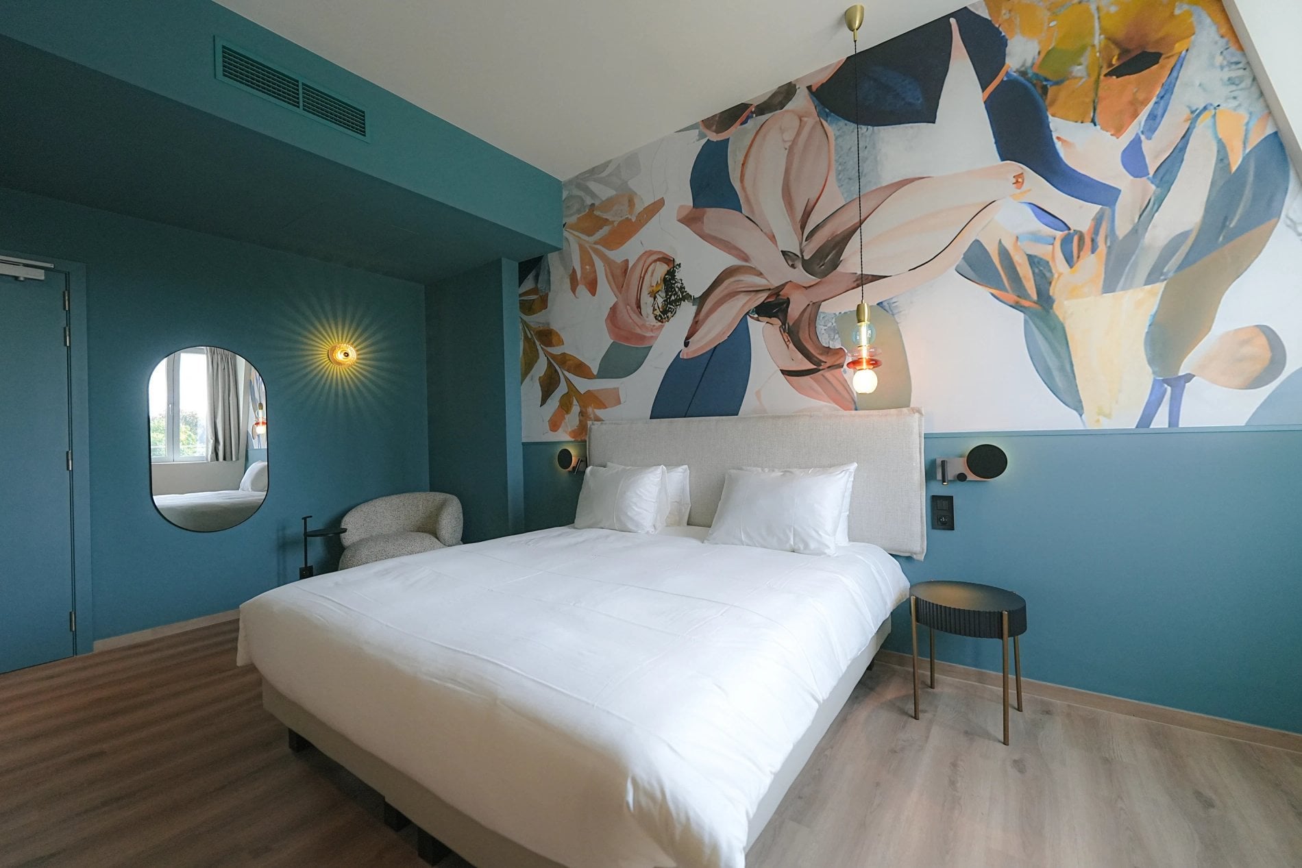 Facade of Martin's Klooster hotel with a view of Leuven's historic center.