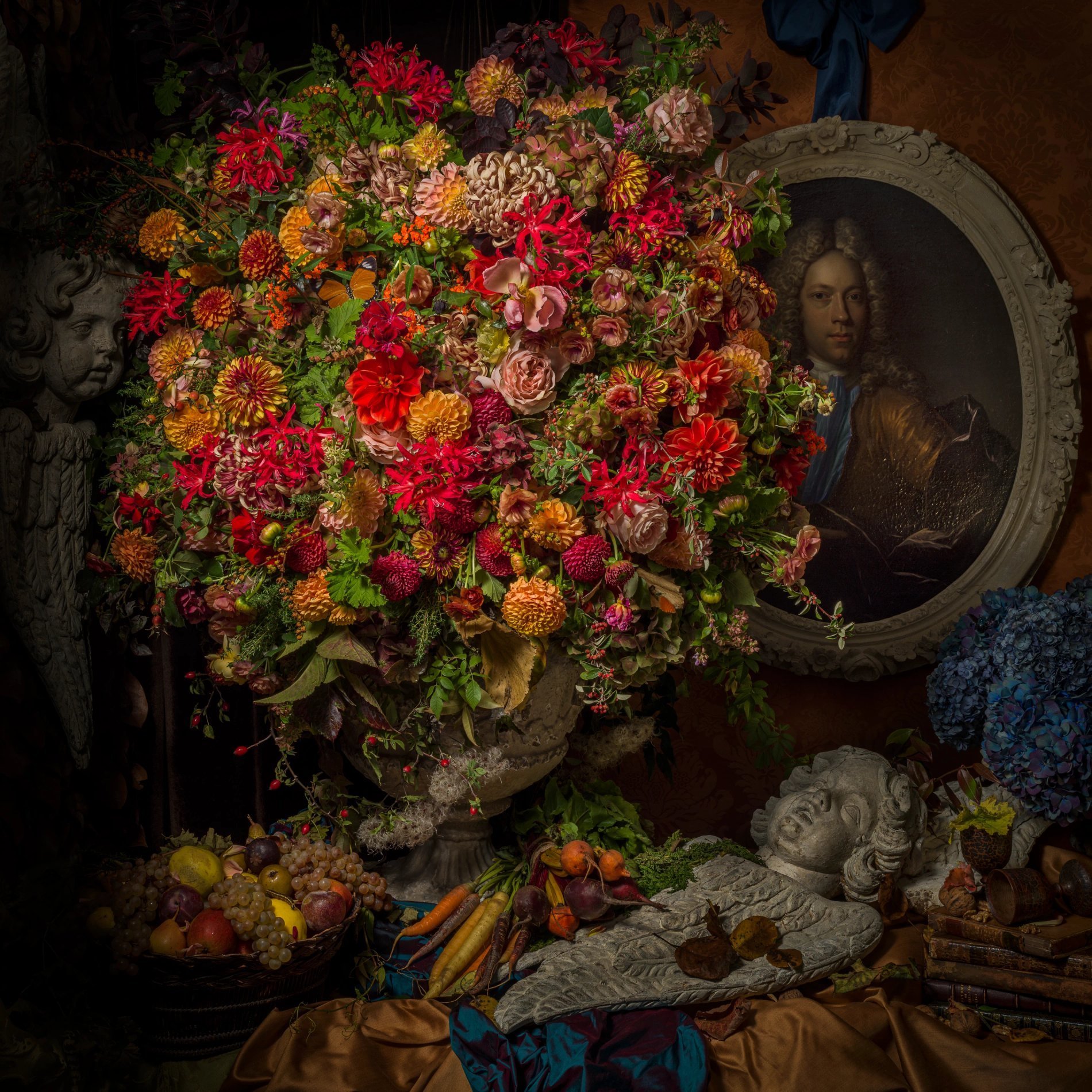 Floral arrangement and antique painting inside Hôtel Prince de Conti