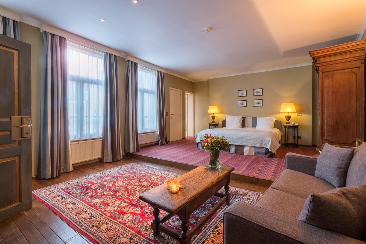 Martin's Relais 4****, Elegante suite met woonkamer in Martin's Relais.