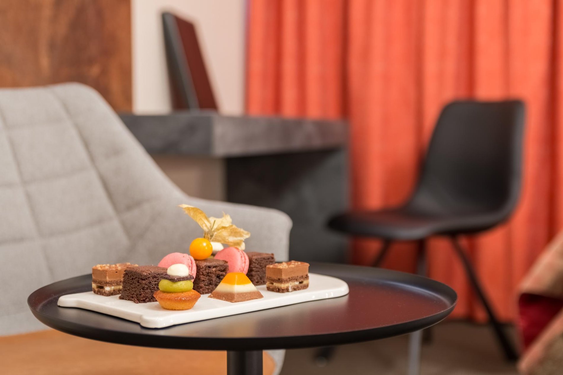 Assortment of elegant desserts on a coffee table