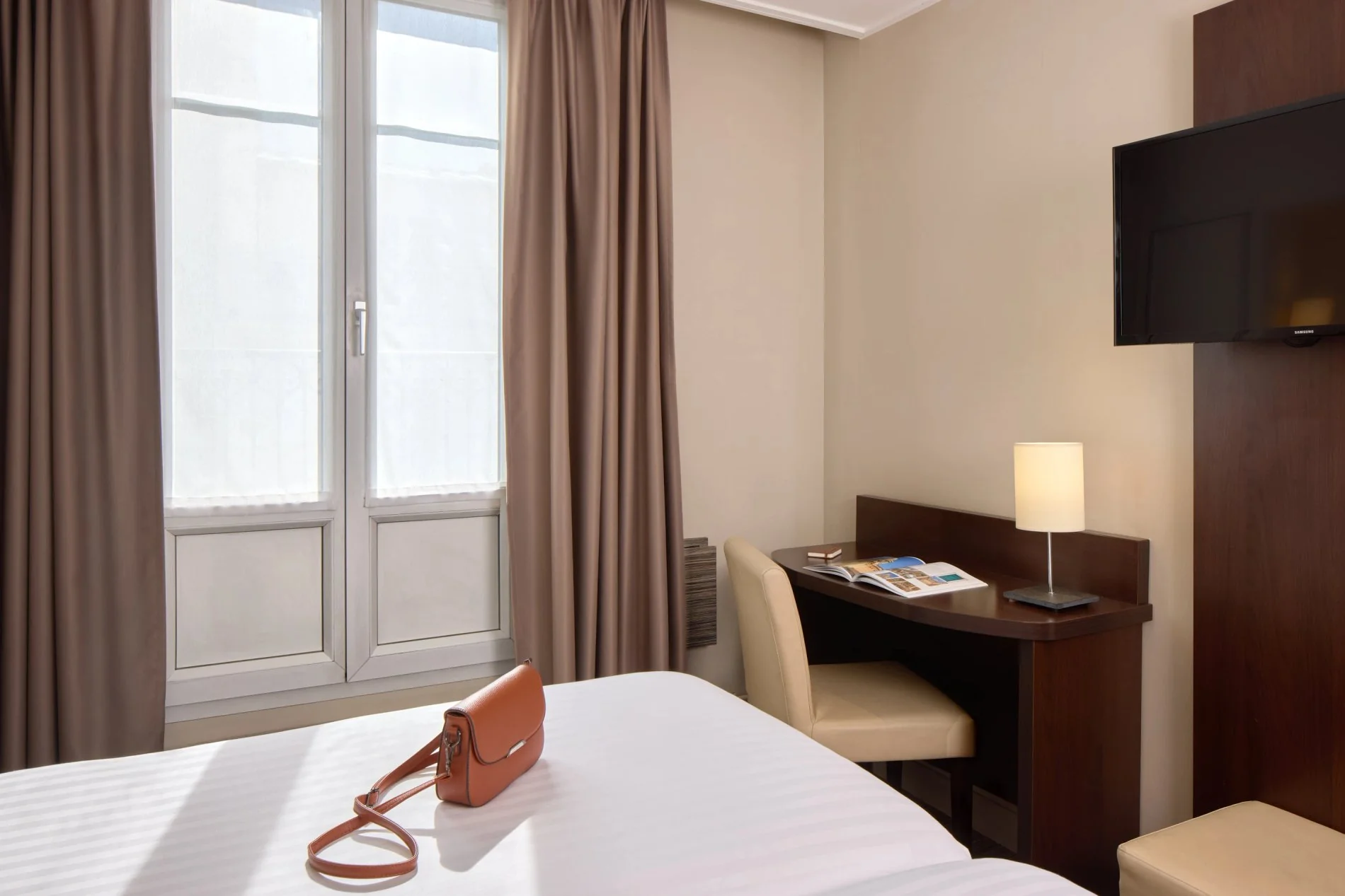 Chambre Confort Lits Jumeaux au Timhotel, avec décoration élégante