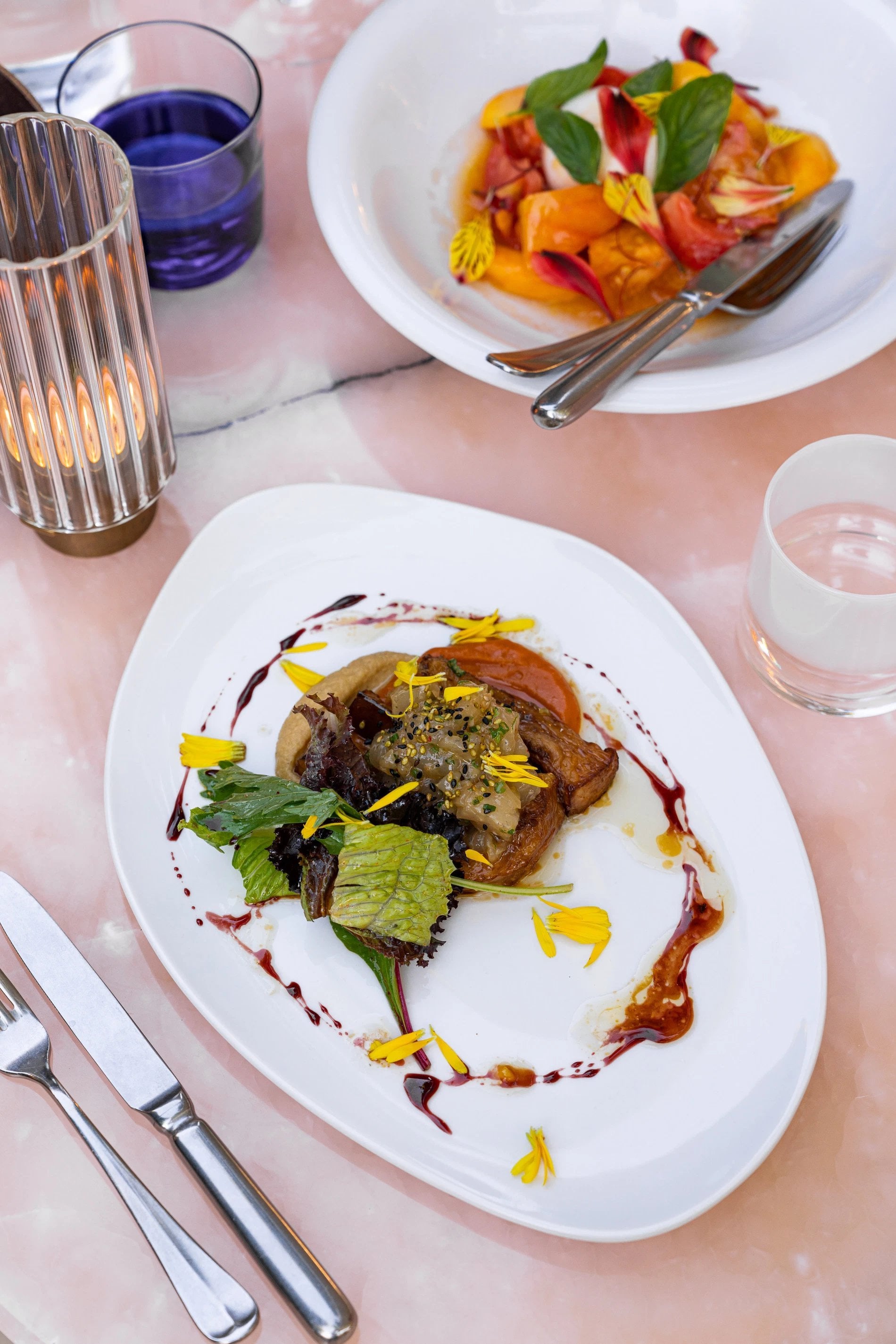 Colorful dishes at Brasserie L’Impé, Maison Albar - L'Imperator, showcasing local cuisine.