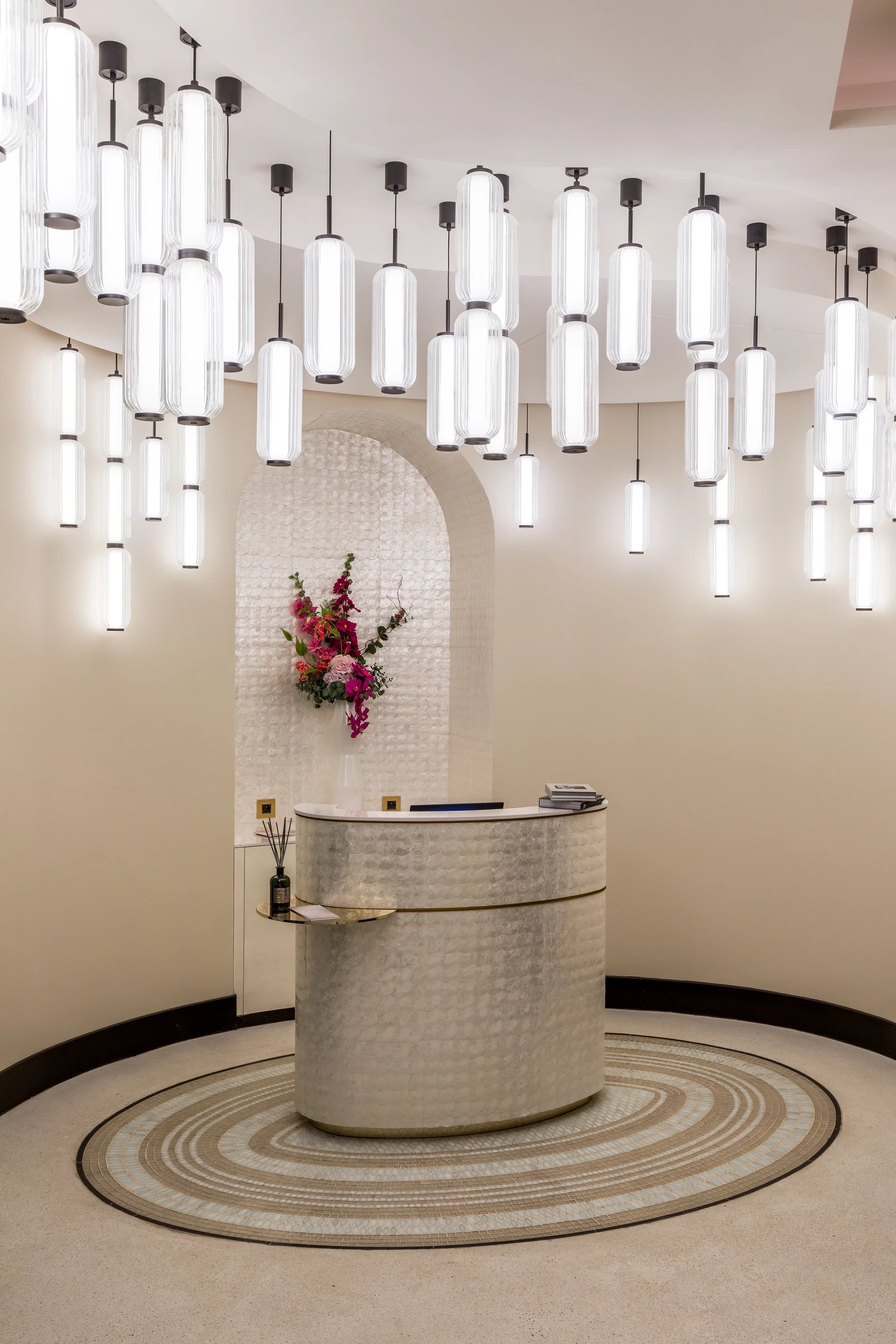 Maison Albar - Le Victoria | SPA home with silver countertop, desiign ceiling light, and flowers