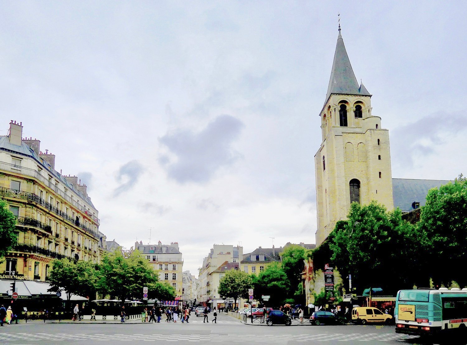 View of Saint-Germain-des-Prés Church and Les Deux Magots café, near Hôtel Prince de Conti