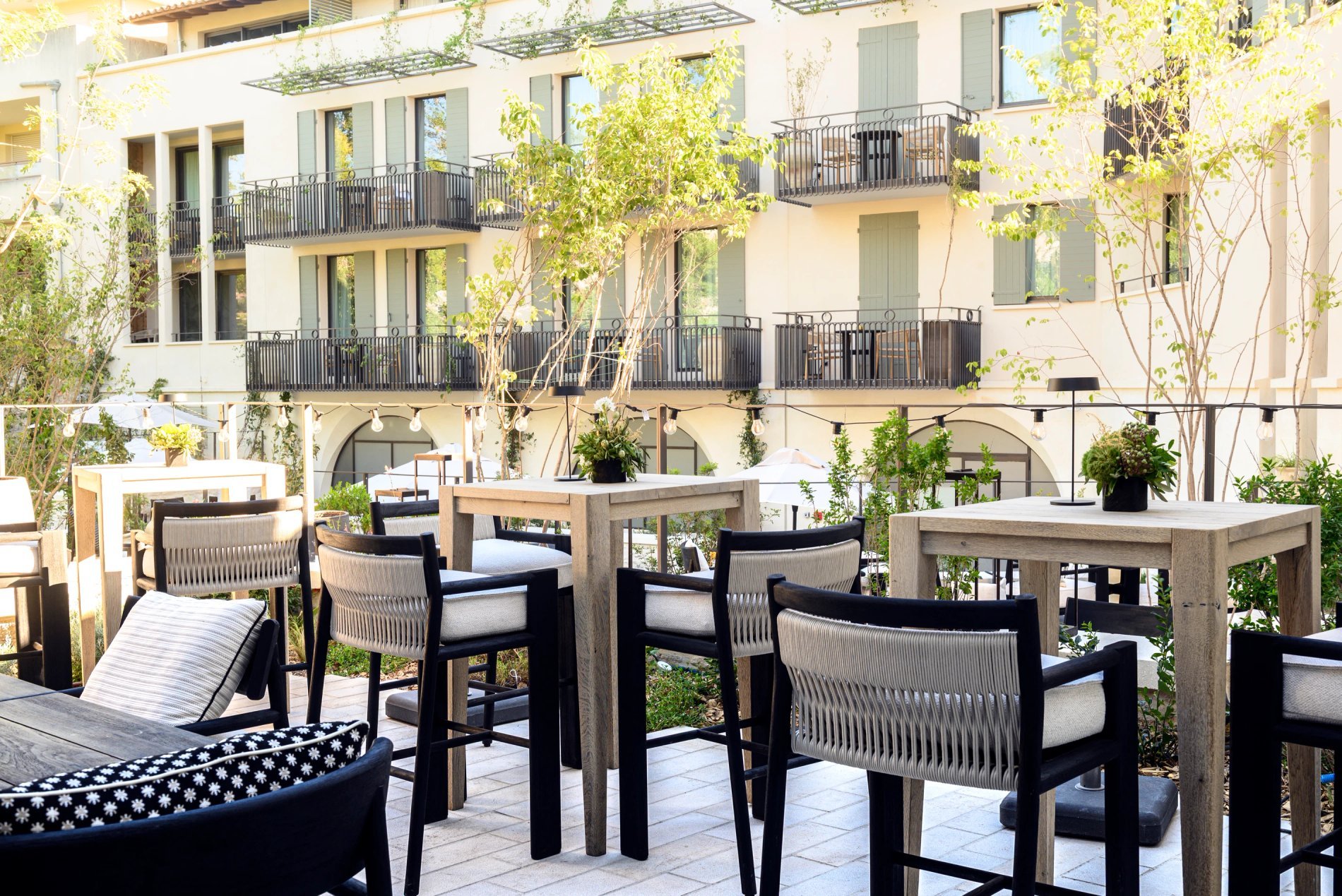 Bright terrace set up for seminar breaks at L’Isle de Leos