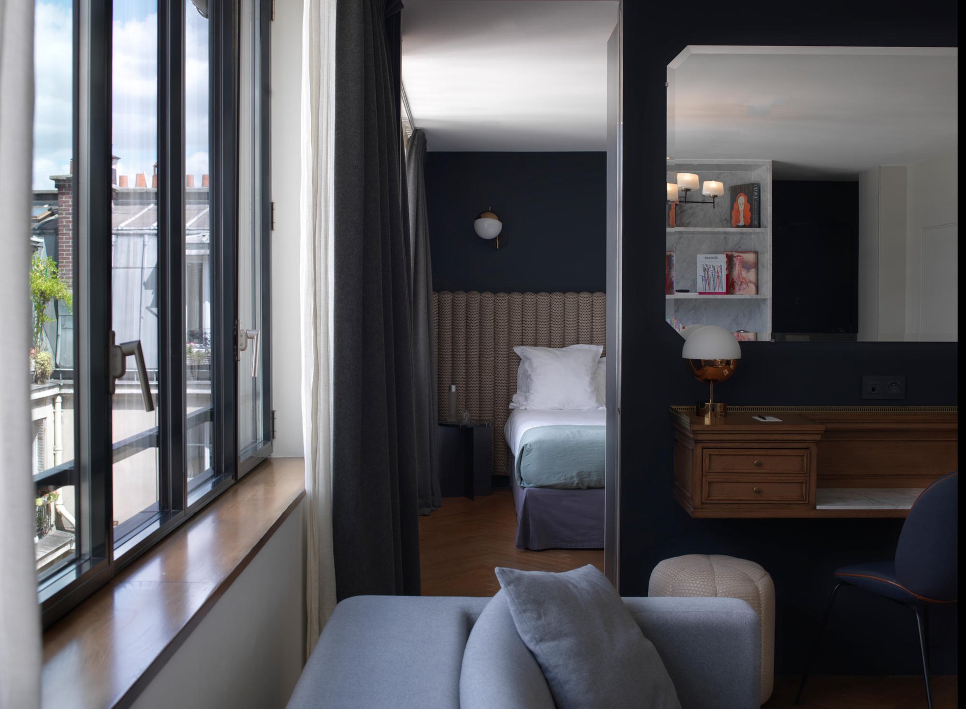 Elegant suite with a view over Paris rooftops at Hôtel Bachaumont