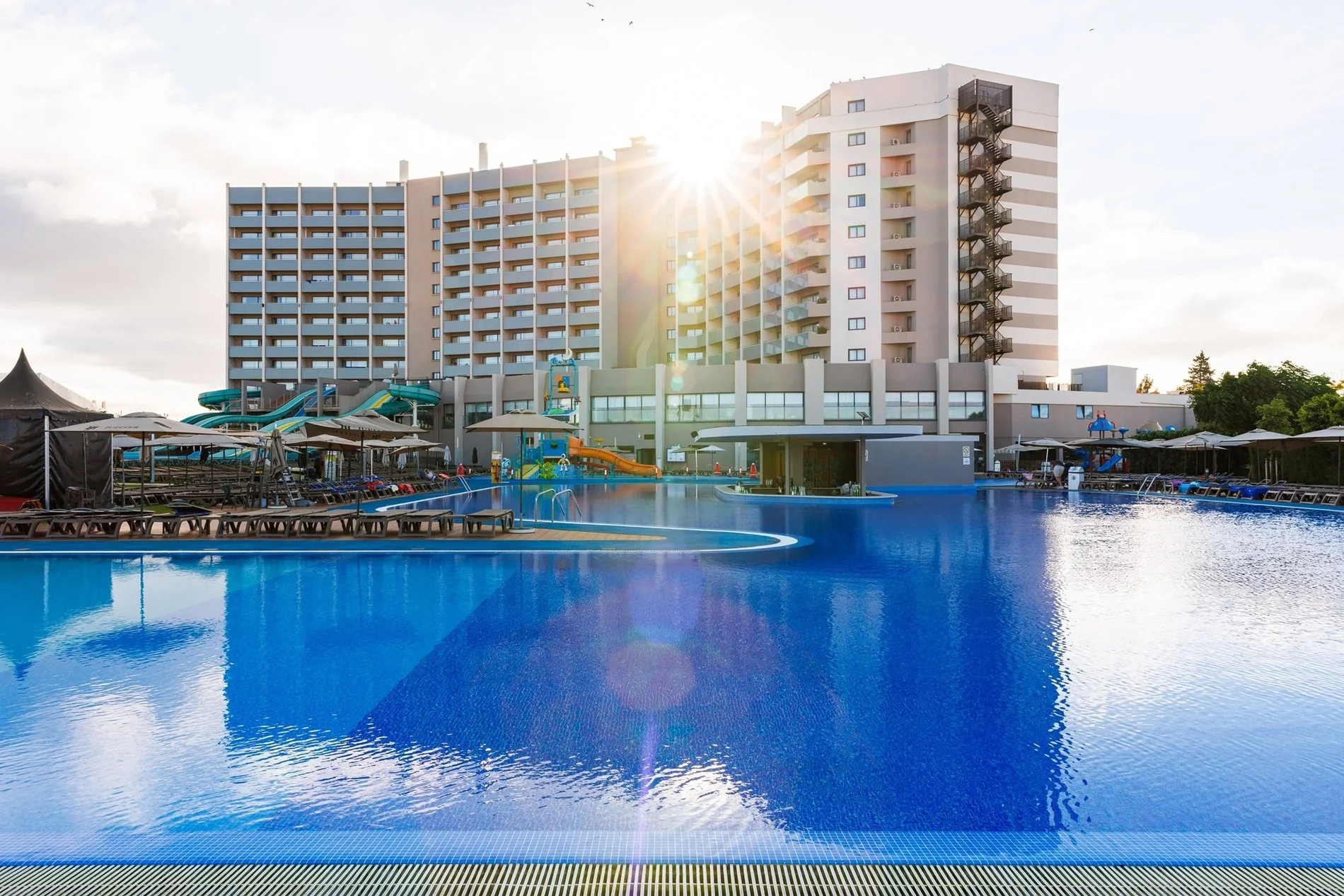 View of the main pool at the end of the day at the Jupiter Albufeira Hotel