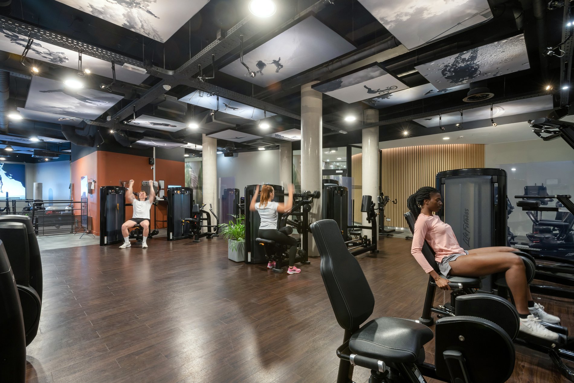 Modern fitness room with personalized coaching at Martin's Hotels.