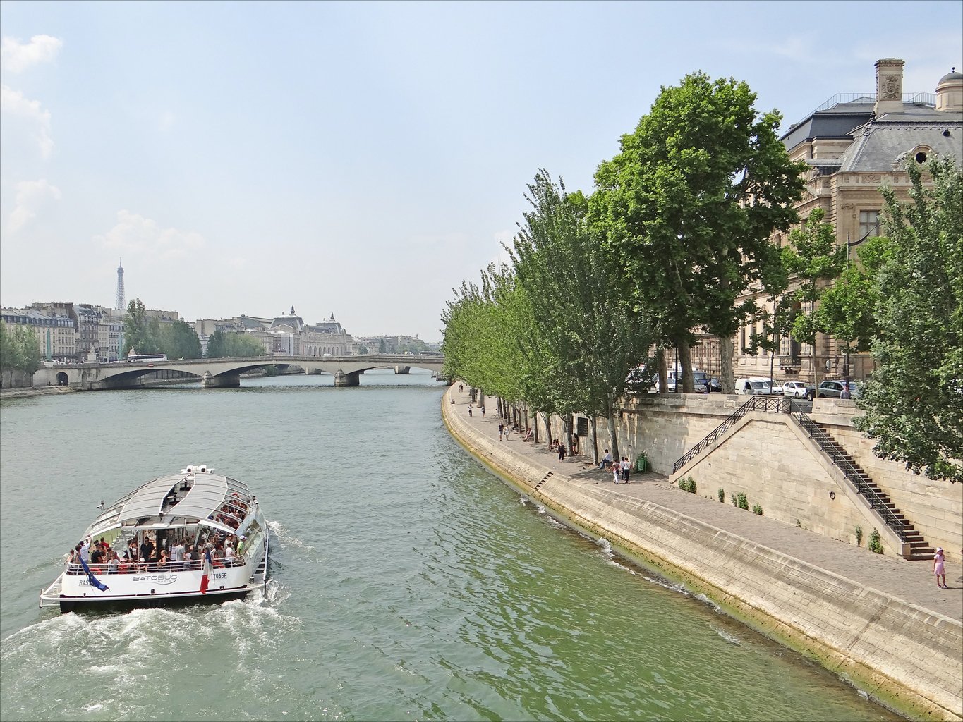 View of the Seine with a barge near Hôtel Prince de Conti