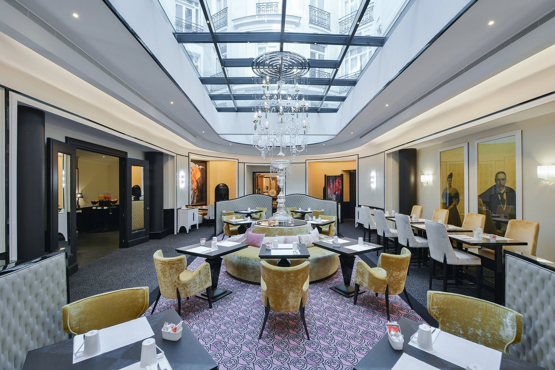 The Dining Room under a glass canopy at the Hotel Maison Astor in Paris