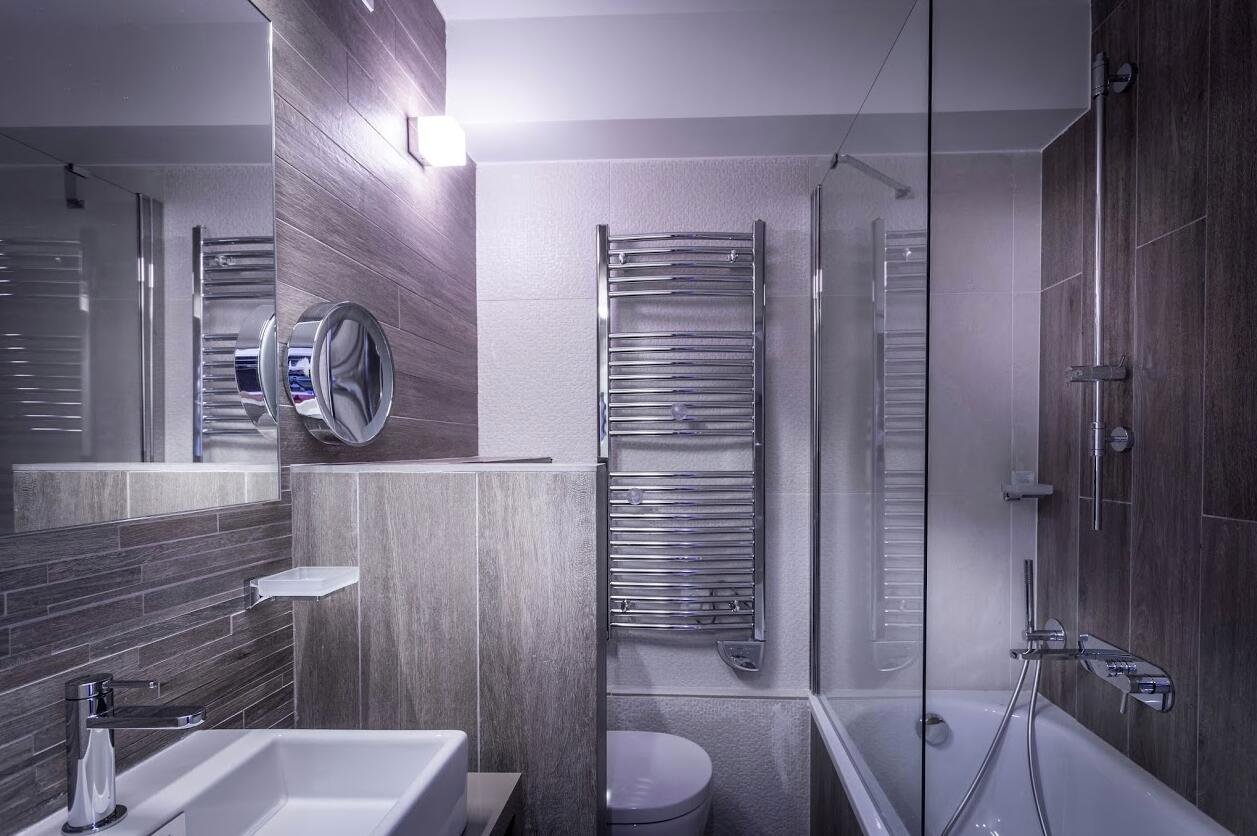 Salle de bain d'une Chambre quadruple classique au Grand Aigle Hôtel & Spa