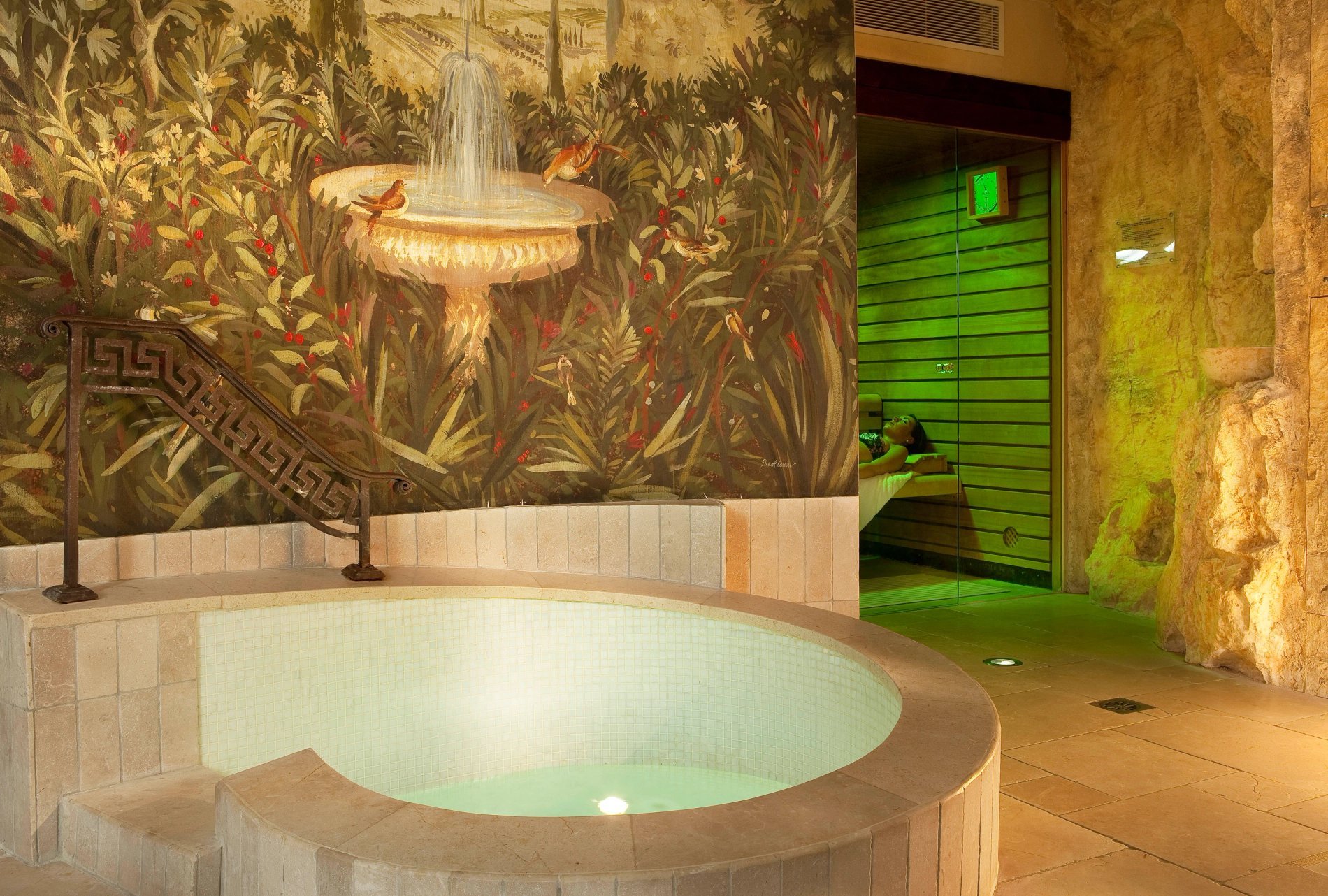 Wellness area at Maison Bérard with hot tub and Provençal decor.