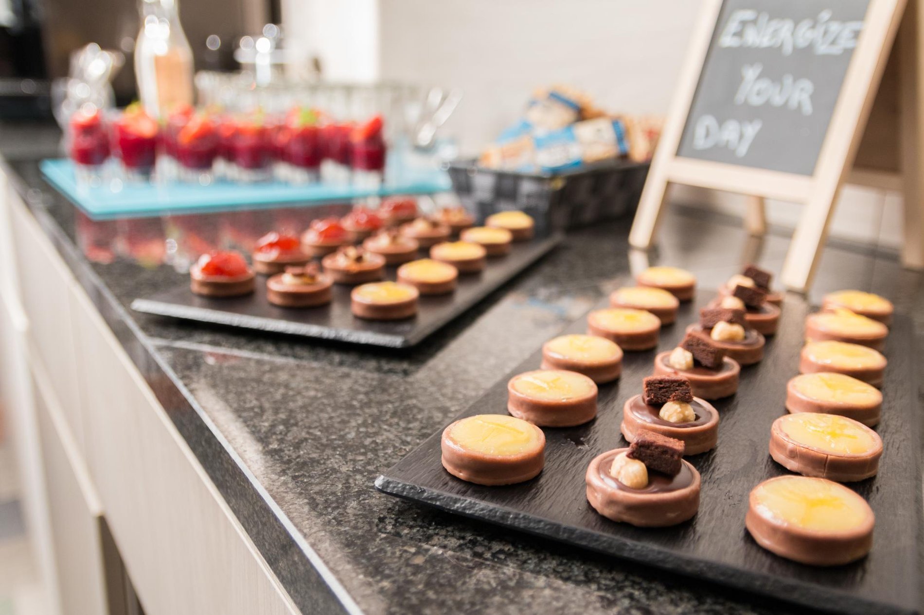 Dessert buffet with colorful pastries and elegant presentation at Martin's Château du Lac.