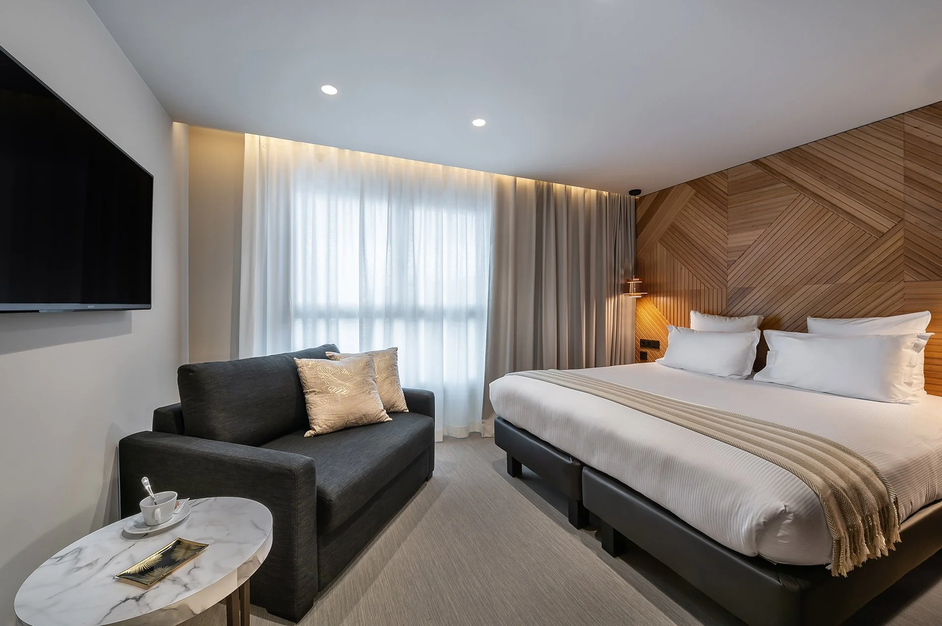Junior Suite — 9Hotel Pâquis Genève, hôtel près de la gare Cornavin