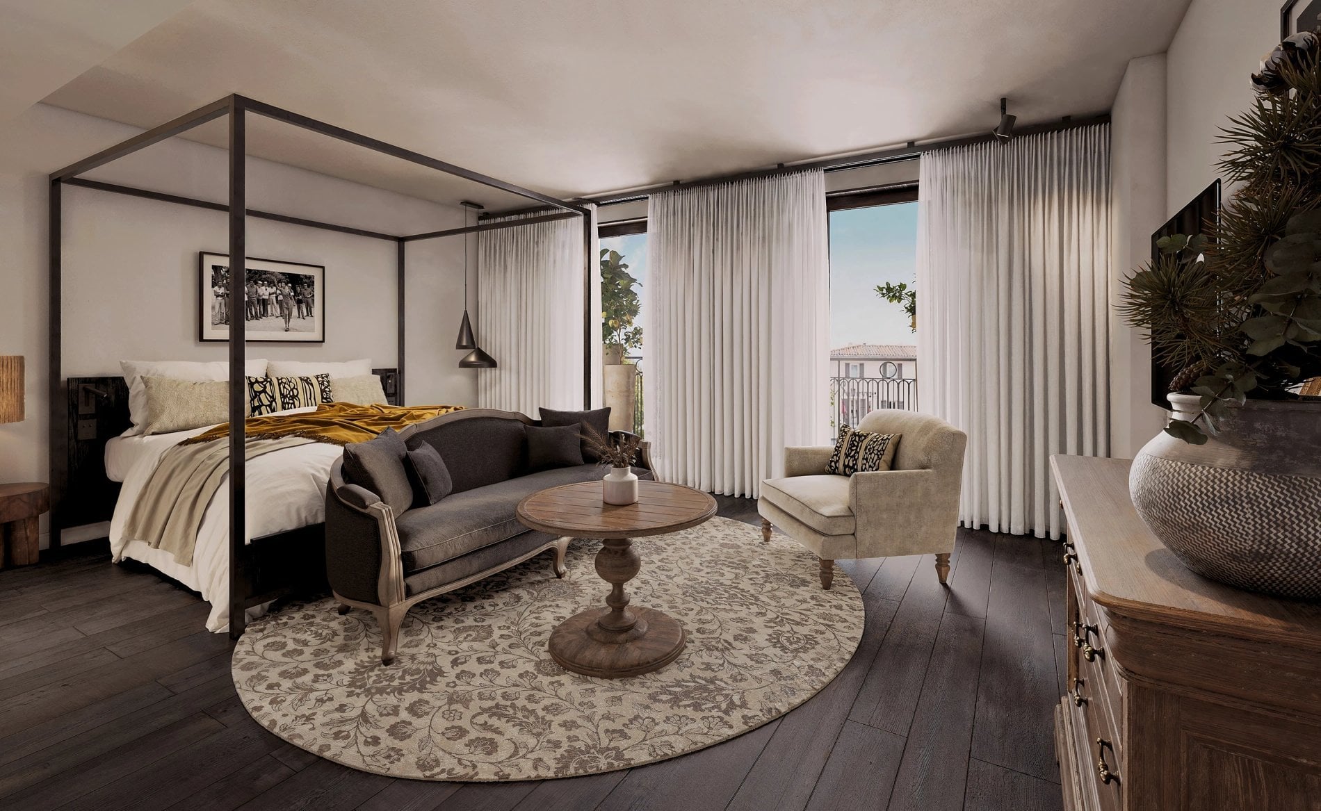 Suite élégante avec coin salon et grande baie vitrée à L'Isle de Leos