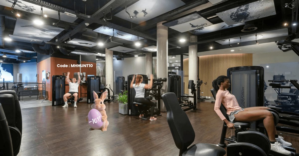 Modern fitness room with personalized coaching at Martin's Hotels.