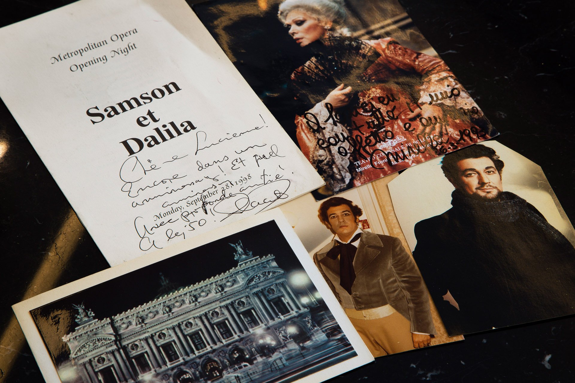 Cultural memorabilia and opera program displayed in a room at Hotel Le 10 Bis